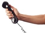 Hand mit Telefonhörer